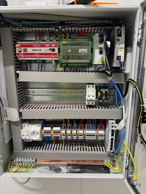 BMS control panel enclosure with networked controllers and I/O modules