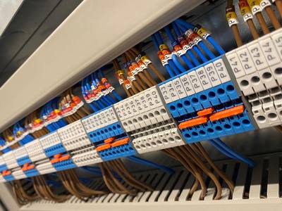 Labelled terminal block wiring within a BMS control panel